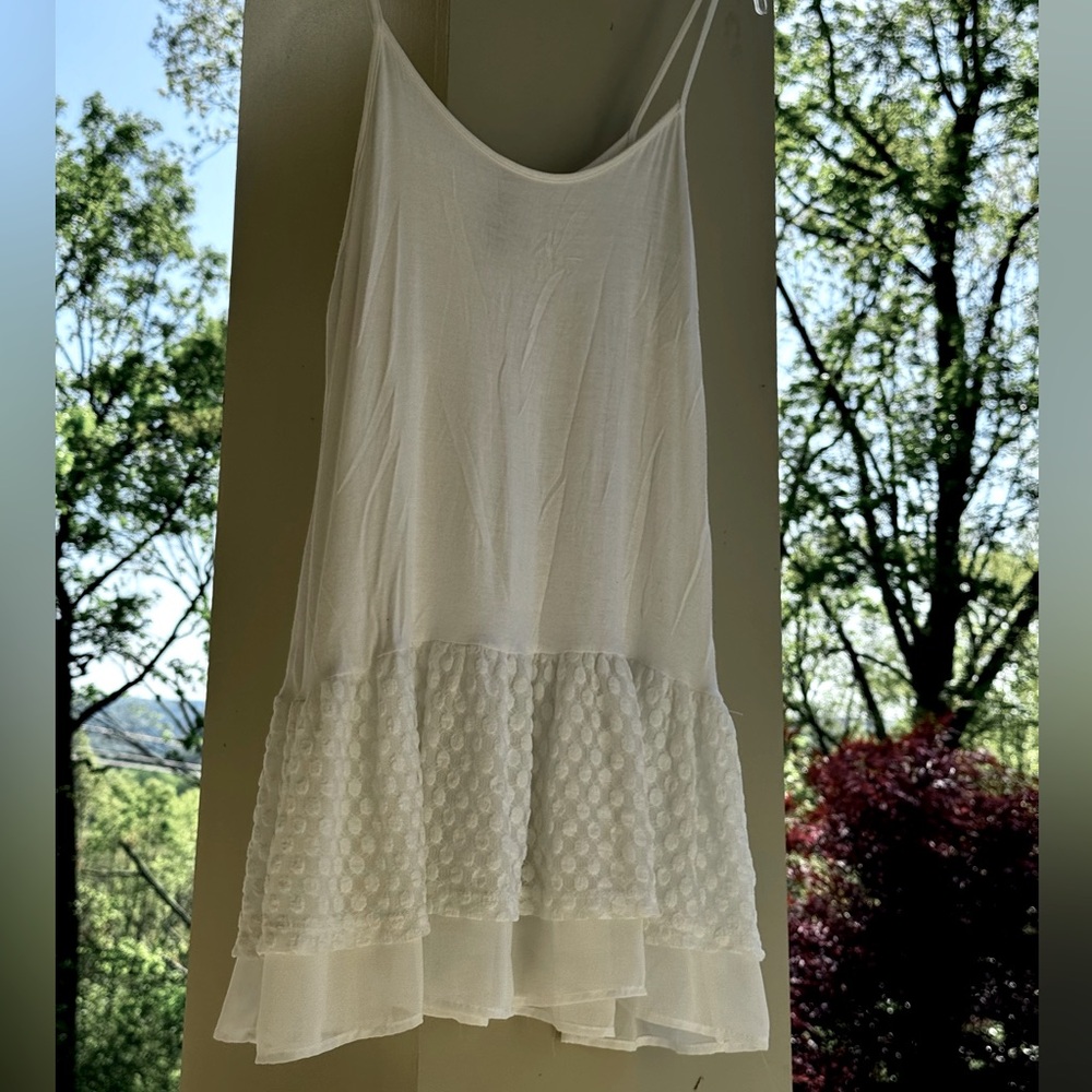 Super Cute White Ruffle Bottom Cami